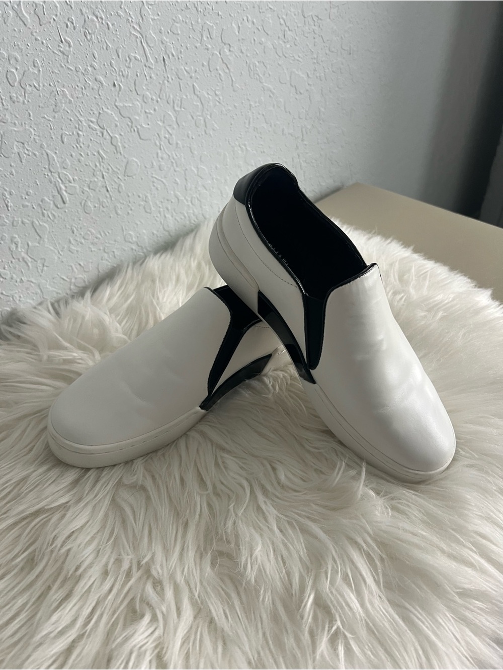 Michael Kors White Slip-On Sneakers with Black Trim
